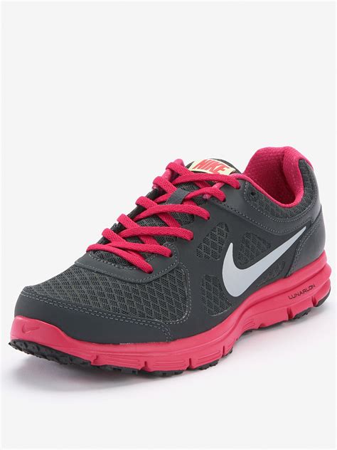 black and pink Nike trainers